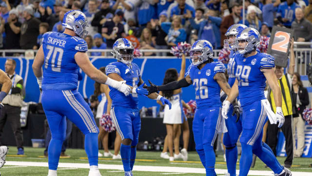Detroit Lions running back Jahmyr Gibbs celebrates a touchdown against the Chicago Bears.
